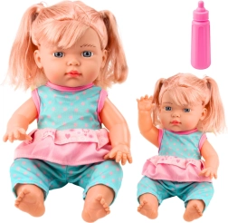Baby doll in a turquoise outfit with bottle and sound
