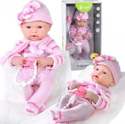 Roze realistische babypop met fopspeen aan ketting en zachte deken