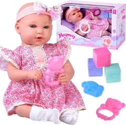 Interactieve baby 46 cm in lila jurkje met accessoires