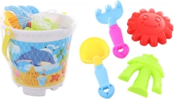 Zandset met emmer, schep, hark en zandvormpjes