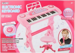 Roze kinderpiano met adapter