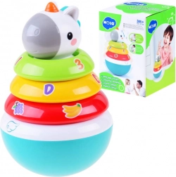 Kleurige stapelspeelgoed met rammelaar en eenhoorn