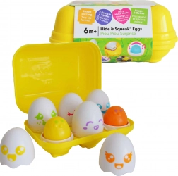 TOMY cheerful squeaky eggs – shape sorter in a yellow box