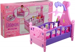 Grote kinderpoppenbed met mobiel en beddengoed
