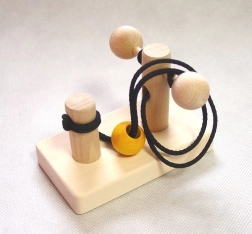 Puzzel Verborgen balletje – houten logische rebus