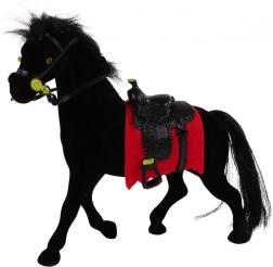 velvet figurine of a black horse with a red saddle pad and saddle