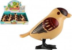 Springende vogeltje op sleutel 11 cm