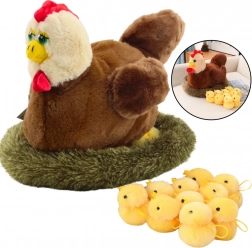Poule en peluche avec poussins et nid