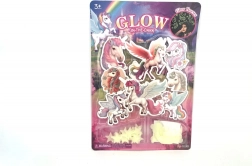 Eenhoorns die in het donker gloeien