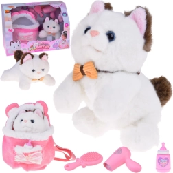 Super-soft plush kitten with heartbeat and bendable paws in a pink backpack