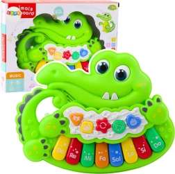 Interactive piano for children with animal sounds and lights in green