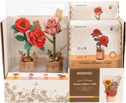 Display met rode camelia en roze roos