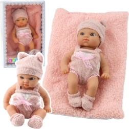 Cloth baby doll with a piece of blanket, pink‑white outfit, cap, 18 cm