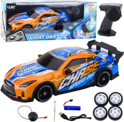 Voiture RC de sport avec carrosserie rétroéclairée et mode drift – orange