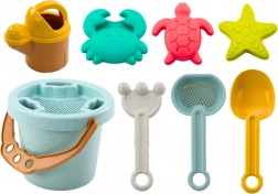 Pastelkleurige zandset met emmer, schep, hark, zeef en vormpjes