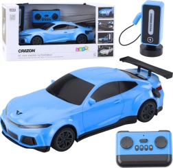 Electric RC racing car with charging station – blue