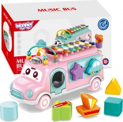 Woopie Baby muzikale bus – vormenstoof met xylofoon, roze