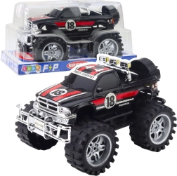 Voiture tout-terrain à propulsion arrière, grandes roues, rouge‑noir