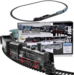 Elektrische spoorbaan met locomotief en wagons