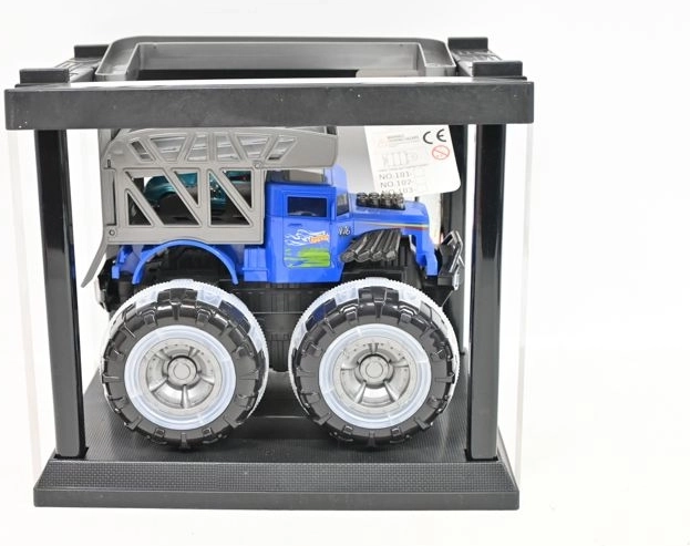 Monster truck in a cage with a small car