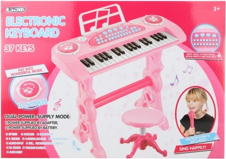 Roze kinderpiano met adapter