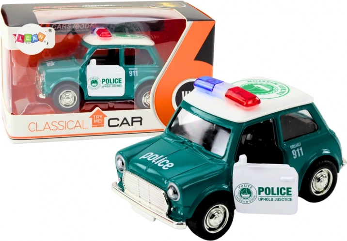 Klassieke politiewagen 1:38 met aandrijving, licht en geluid groen