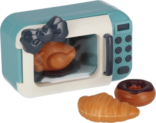 Micro-ondes avec gourmandises pour la cuisine des enfants