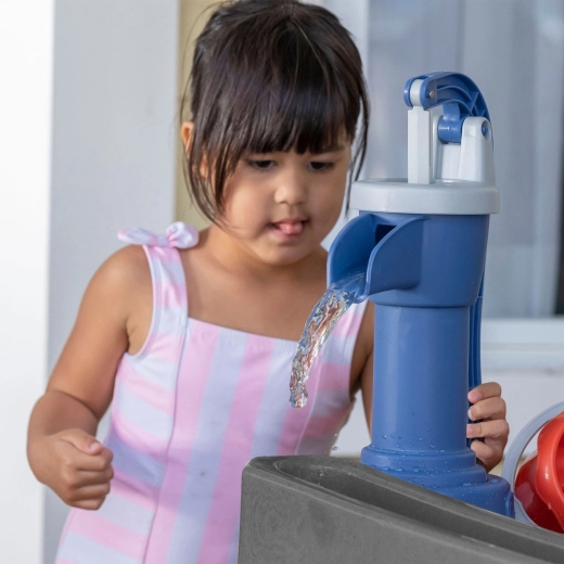 Realistic hand pump for interactive play