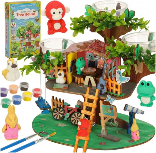 Creatieve set boomhut met accessoires en plantengroei