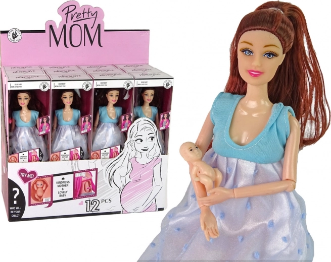 Pregnant doll in a blue dress with baby