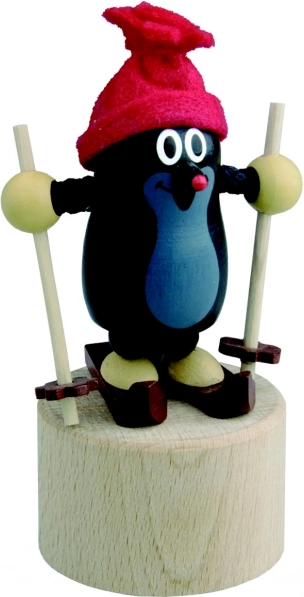 Detoa Pressing Figure Mole on Skis