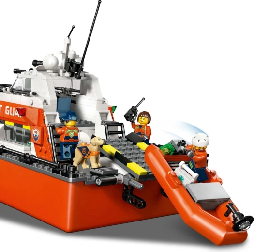 Floating rescue boat with ramp and helipad
