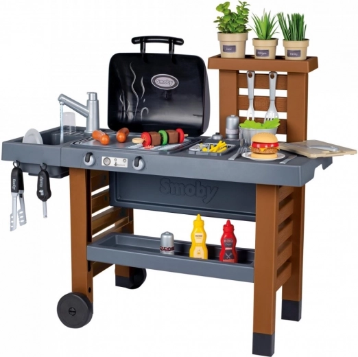 Outdoor kids’ kitchen with grill, deep fryer, and water function