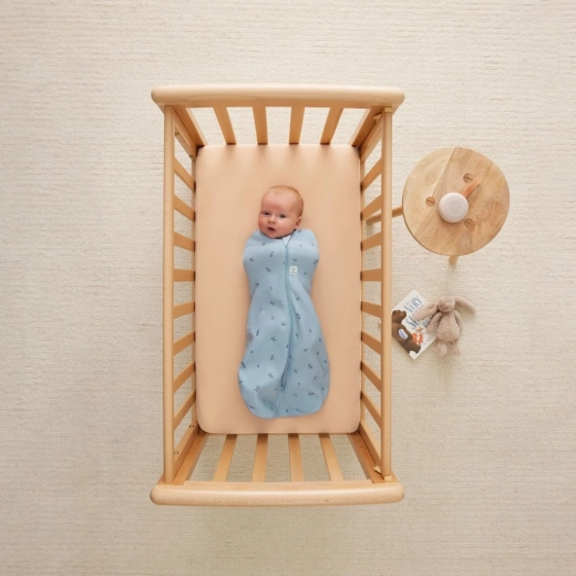 Swaddle and sleeping bag in one