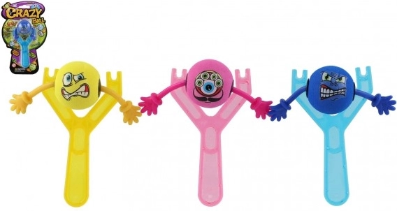Plastic slingshot with emoji 14 cm in three colors