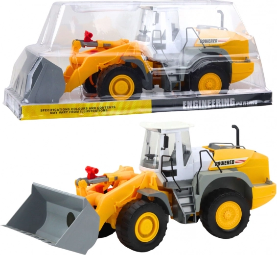 Construction loader with gray and yellow bucket, flywheel drive
