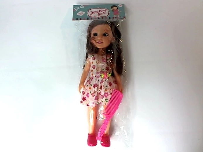 Poupée 33 cm avec peigne