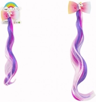 Haarclip met een regenboogkleurige eenhoorn charm
