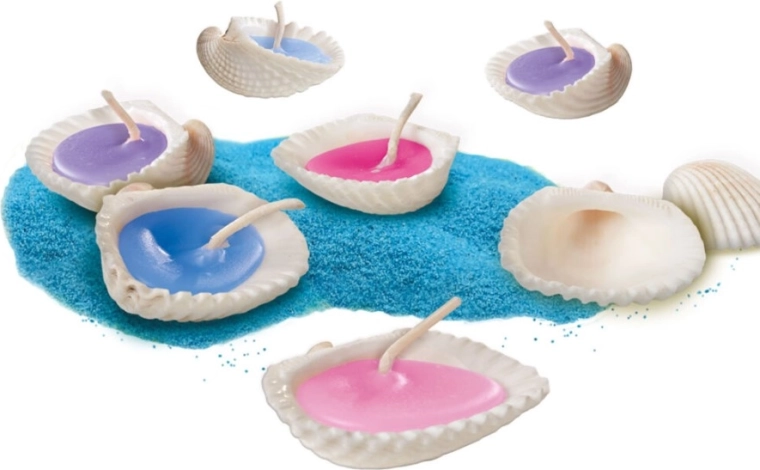 Kaarsen in echte schelpen