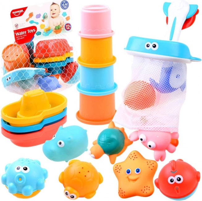 Ensemble coloré de jouets de bain avec organiseur, petits bateaux et animaux
