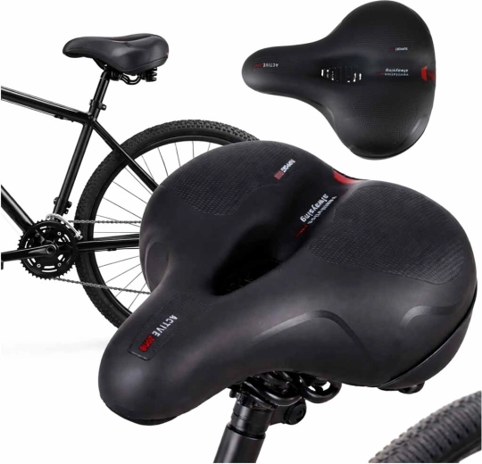 wide cycling saddle made of elastic foam with reflector