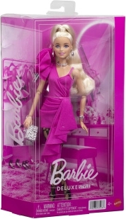 Barbie Deluxe Style doll in a pink ruffle dress