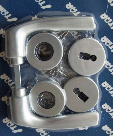 Ferrures de porte à rosace MONET, clé, anodisé argent