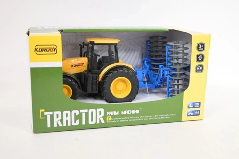 Tracteur avec charrue attelable, avec lumière et son