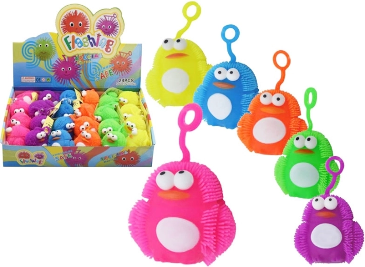 light-up anti-stress penguin 7 cm, wind-up, mixed colors