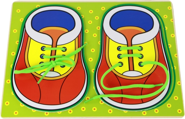 Houten leerspeelgoed We leren veters strikken