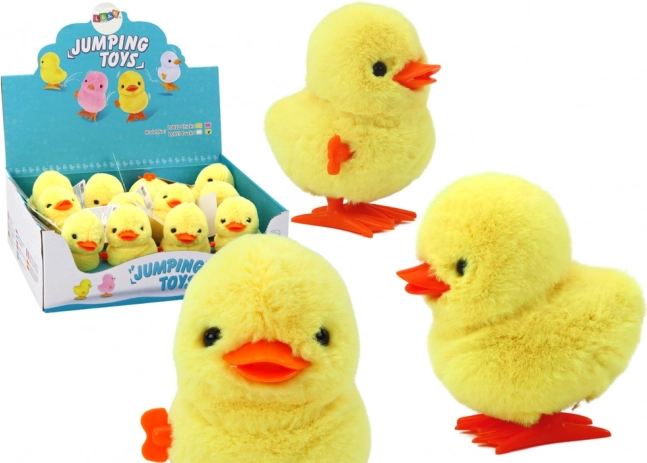 Jumping wind-up plush chick yellow