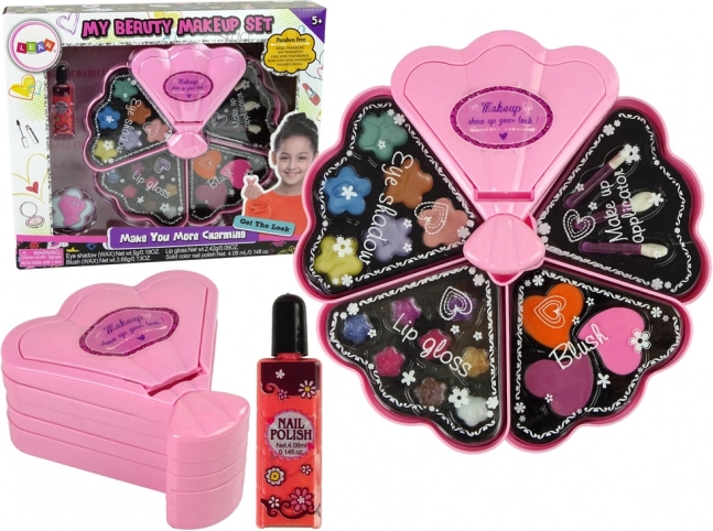 Roze cosmeticaset in de vorm van een schelp