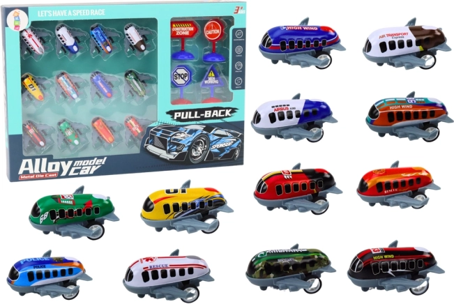 Set van 12 speelgoed in de vorm van vliegtuigen met aandrijving en verkeersborden