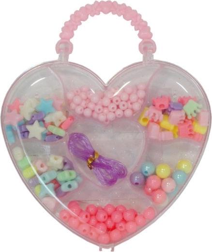 Gekleurde kralen in een hartvormige box voor het maken van armbanden